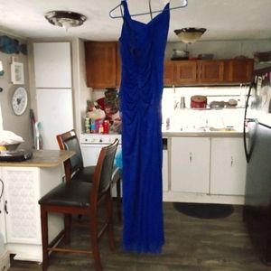 Woman's evening gown/ prom dress. Needs a small re